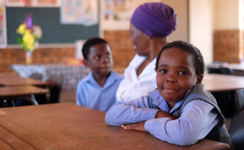 Government Collaboration to Improve School Libraries and Teacher Training